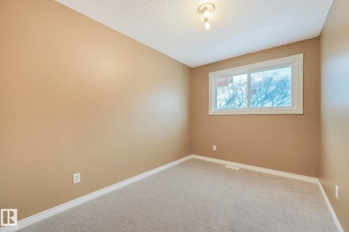 58 Huron Street S, Devon, AB - Indoor Photo Showing Other Room