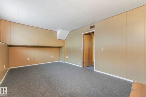58 Huron Street S, Devon, AB - Indoor Photo Showing Other Room