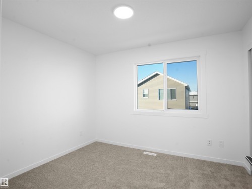 32 1009 Cy Becker Road, Edmonton, AB - Indoor Photo Showing Other Room