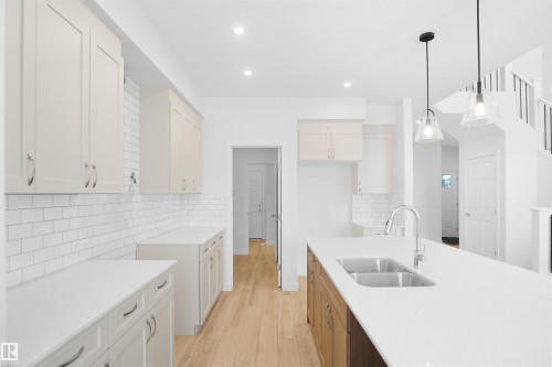 1323 11 Avenue, Edmonton, AB - Indoor Photo Showing Kitchen With Double Sink With Upgraded Kitchen