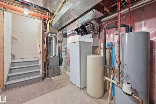Utilities featuring water heater and heating unit - 2031 Westerra Loop, Stony Plain, AB - Indoor Photo Showing Basement
