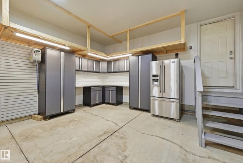 Kitchen featuring high end refrigerator and gray cabinetry - 2031 Westerra Loop, Stony Plain, AB - Indoor