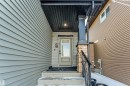 Doorway to property with stone siding - 2629 15A Avenue, Edmonton, AB  - Outdoor With Exterior 