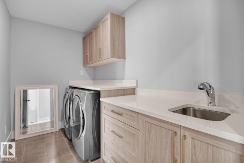97 Mockingbird Crescent, Fort Saskatchewan, AB - Indoor Photo Showing Laundry Room