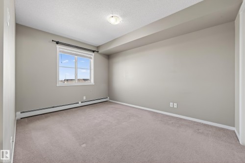 404 5370 Chappelle Road, Edmonton, AB - Indoor Photo Showing Other Room