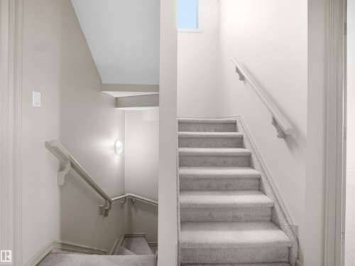 Staircase with carpet floors - 1708 62 Street, Edmonton, AB - Indoor Photo Showing Other Room