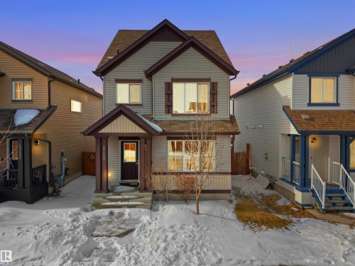 View of front of house featuring a shingled roof - 1708 62 Street, Edmonton, AB - Outdoor With Deck Patio Veranda With Facade