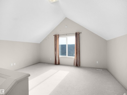 Bonus room with carpet floors and baseboards - 1708 62 Street, Edmonton, AB - Indoor Photo Showing Other Room