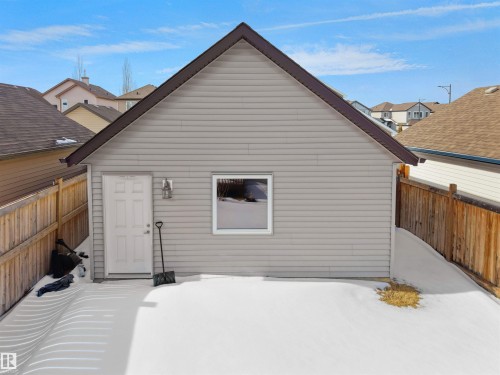 Rear view of house with a fenced backyard - 1708 62 Street, Edmonton, AB - Outdoor With Exterior