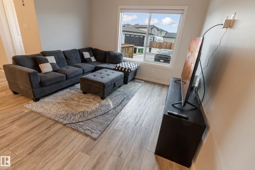 Living area featuring light wood-type flooring - 304 36 Avenue, Edmonton, AB - Indoor Photo Showing Living Room