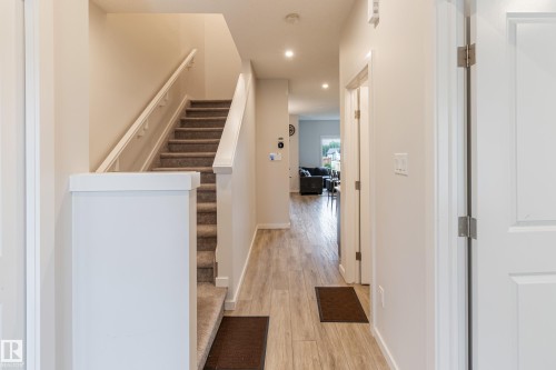 Hall with recessed lighting and light wood finished floors - 304 36 Avenue, Edmonton, AB - Indoor Photo Showing Other Room