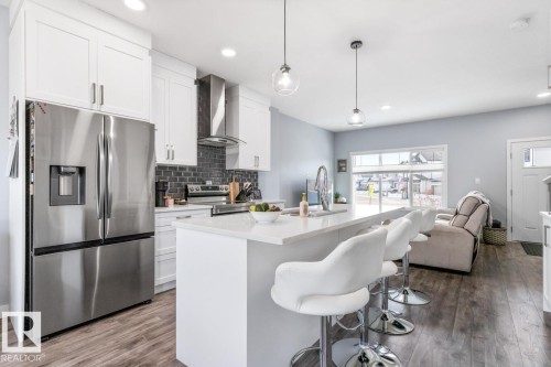 609 Black Stone Boulevard, Leduc, AB - Indoor Photo Showing Kitchen With Upgraded Kitchen