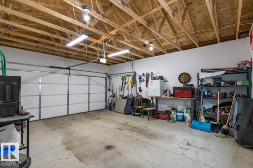 609 Black Stone Boulevard, Leduc, AB - Indoor Photo Showing Garage