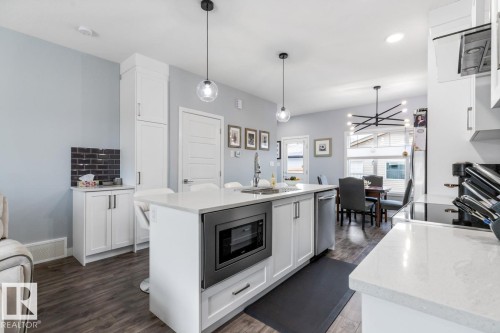 609 Black Stone Boulevard, Leduc, AB - Indoor Photo Showing Kitchen With Double Sink With Upgraded Kitchen