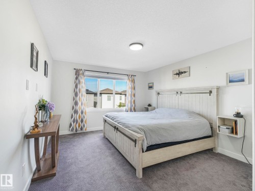 111 Bluff Cove, Leduc, AB - Indoor Photo Showing Bedroom