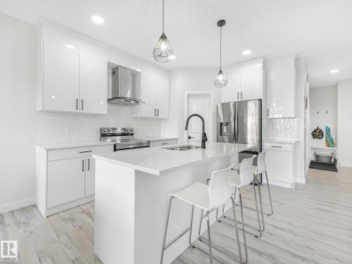 111 Bluff Cove, Leduc, AB - Indoor Photo Showing Kitchen With Double Sink With Upgraded Kitchen