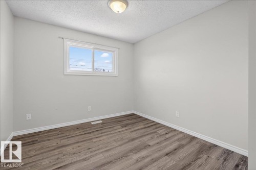 8 Erie Street S, Devon, AB - Indoor Photo Showing Other Room