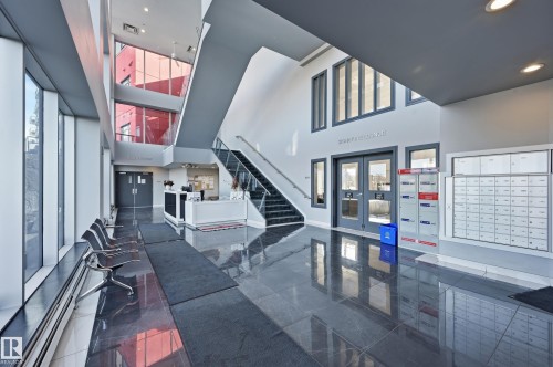 Lobby featuring a high ceiling and recessed lighting - 511 5151 Windermere Boulevard, Edmonton, AB - Indoor Photo Showing Other Room