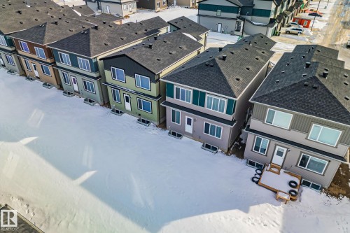 Snowy aerial view featuring a residential view - 3524 41 Ave, Beaumont, AB - Outdoor