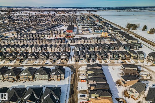 Aerial view of property's location featuring nearby suburban area - 3524 41 Ave, Beaumont, AB - Outdoor With Body Of Water With View