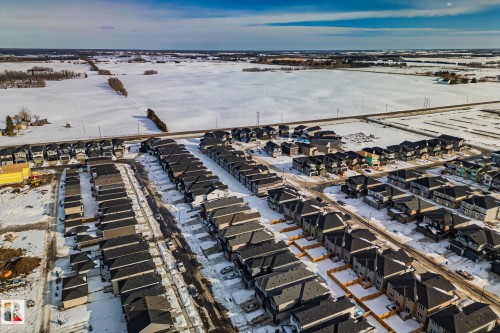 View of snowy aerial view - 3524 41 Ave, Beaumont, AB - Outdoor With View