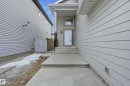 View of exterior entry - 1346 Cunningham Drive W, Edmonton, AB  - Outdoor 