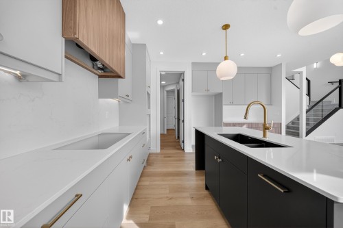 211 Paterson Link Link, Edmonton, AB - Indoor Photo Showing Kitchen With Double Sink With Upgraded Kitchen