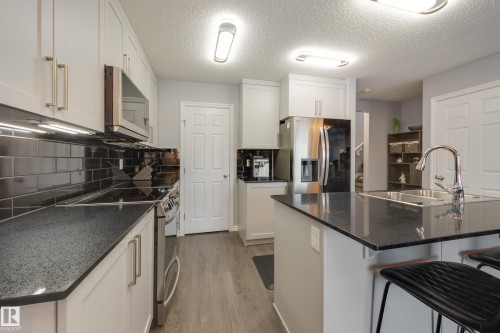 8 Ebbers Close, Edmonton, AB - Indoor Photo Showing Kitchen With Double Sink
