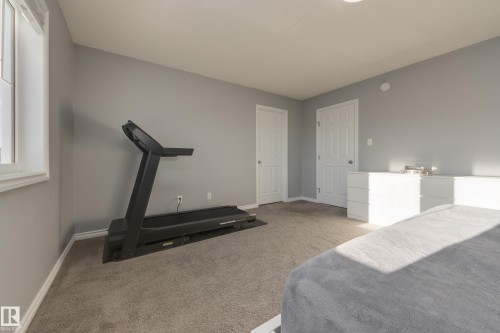8 Ebbers Close, Edmonton, AB - Indoor Photo Showing Gym Room