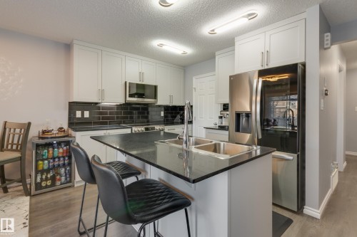 8 Ebbers Close, Edmonton, AB - Indoor Photo Showing Kitchen With Double Sink