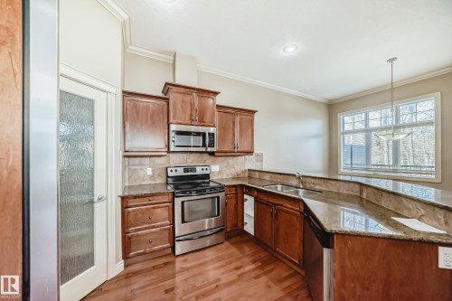 13 12610 15 Avenue, Edmonton, AB - Indoor Photo Showing Kitchen With Double Sink