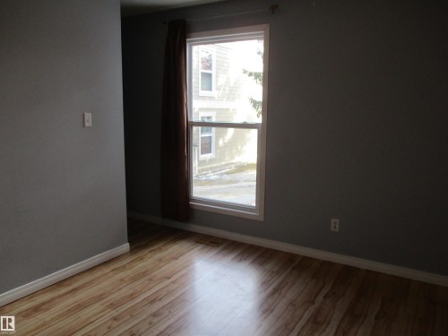 Empty room featuring light wood-style flooring and baseboards - 1186 Saddleback Road, Edmonton, AB - Indoor Photo Showing Other Room