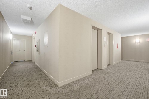 11th floor hallways and elevators. - 1105 8340 Jasper Avenue, Edmonton, AB - Indoor Photo Showing Other Room
