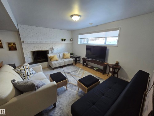 10282 87 Street, Edmonton, AB - Indoor Photo Showing Living Room With Fireplace