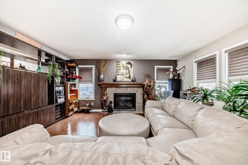 351 Griesbach School Road, Edmonton, AB - Indoor Photo Showing Living Room With Fireplace