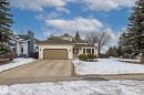 View of front of property featuring an attached garage and driveway - 175 Roy Street, Edmonton, AB  - Outdoor With Facade 