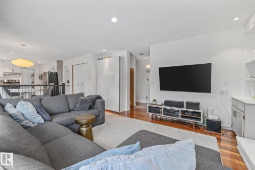 Living room with wood finished floors and recessed lighting - 175 Roy Street, Edmonton, AB - Indoor Photo Showing Living Room