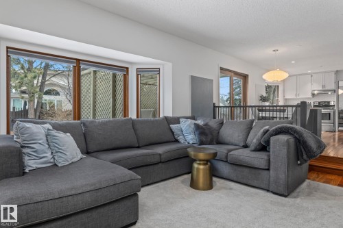 Living area featuring a textured ceiling and recessed lighting - 175 Roy Street, Edmonton, AB - Indoor Photo Showing Living Room