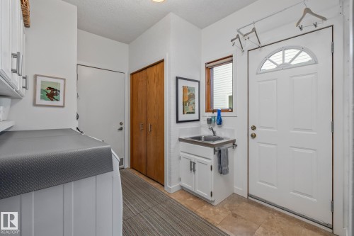 Entryway featuring a textured ceiling - 175 Roy Street, Edmonton, AB - Indoor Photo Showing Other Room
