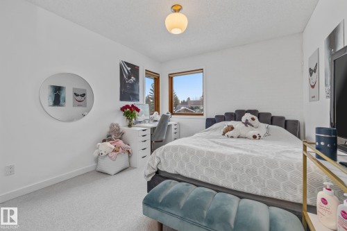 Bedroom featuring baseboards and a textured ceiling - 175 Roy Street, Edmonton, AB - Indoor Photo Showing Bedroom