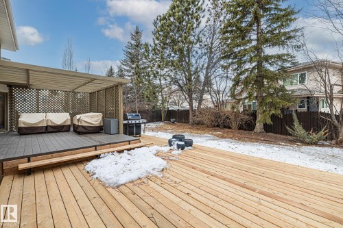 Snow covered deck with a fenced backyard and grilling area - 175 Roy Street, Edmonton, AB - Outdoor With Deck Patio Veranda