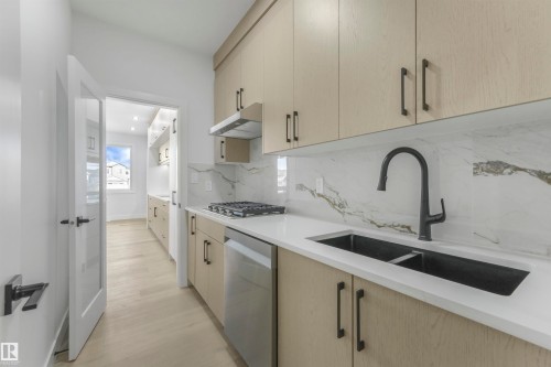 3510 44 Avenue, Beaumont, AB - Indoor Photo Showing Kitchen With Double Sink With Upgraded Kitchen