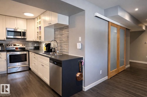 6111 18 Avenue, Edmonton, AB - Indoor Photo Showing Kitchen With Double Sink
