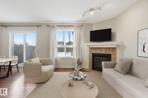 2424 Casselman Crescent, Edmonton, AB - Indoor Photo Showing Living Room With Fireplace