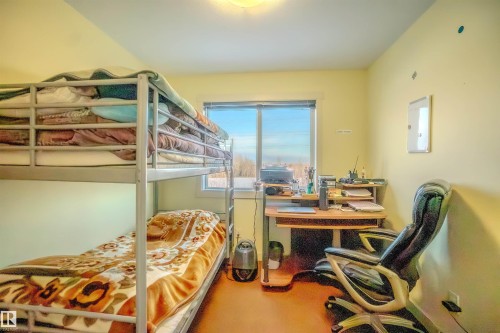 Bedroom with a desk - 5244 1A Avenue Sw, Edmonton, AB - Indoor