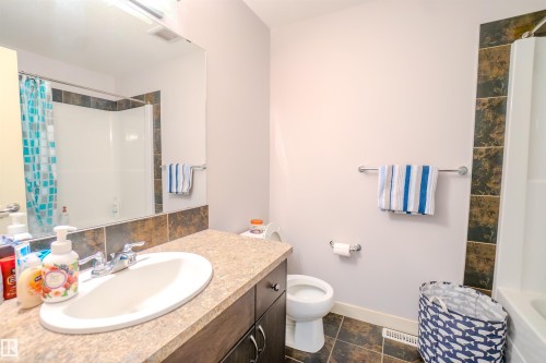 Full bathroom featuring vanity and shower / tub combo - 5244 1A Avenue Sw, Edmonton, AB - Indoor Photo Showing Bathroom