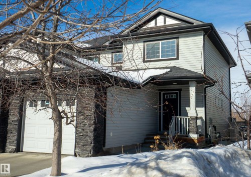 View of front of house with a garage and a porch - 5244 1A Avenue Sw, Edmonton, AB - Outdoor