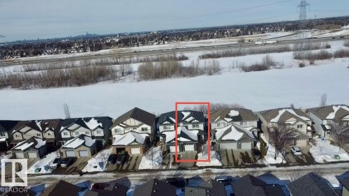 Aerial perspective of suburban area with property boundaries highlighted - 5244 1A Avenue Sw, Edmonton, AB - 