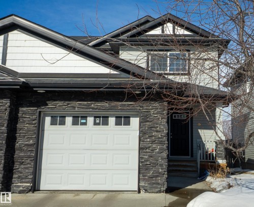 View of front of home with stone siding - 5244 1A Avenue Sw, Edmonton, AB - Outdoor