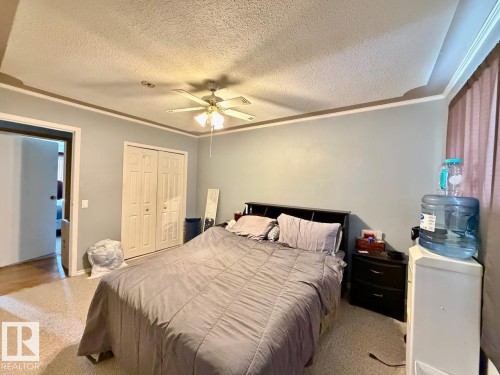 4802 Mackenzie Av, Drayton Valley, AB - Indoor Photo Showing Bedroom